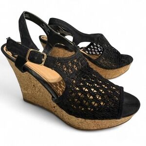 Fergalicious black wedge sandals with cork heel and adjustable strap. Size: 6.5